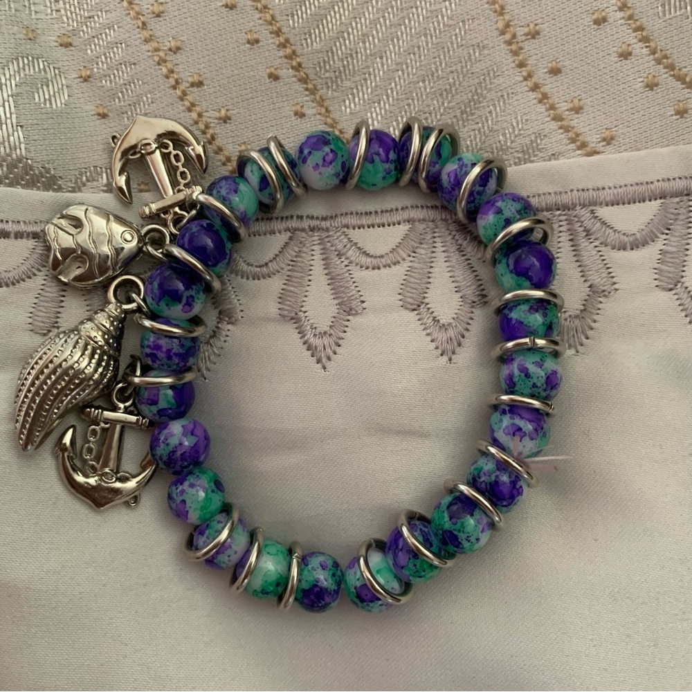 Unisex, purple and blue stone bracelet w/ 2 Anchor charms, 1 fish and 1…